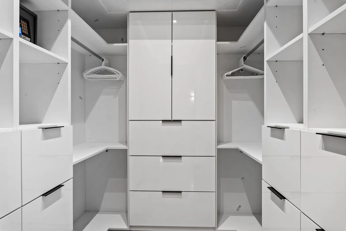 Built-in white dressing room storage